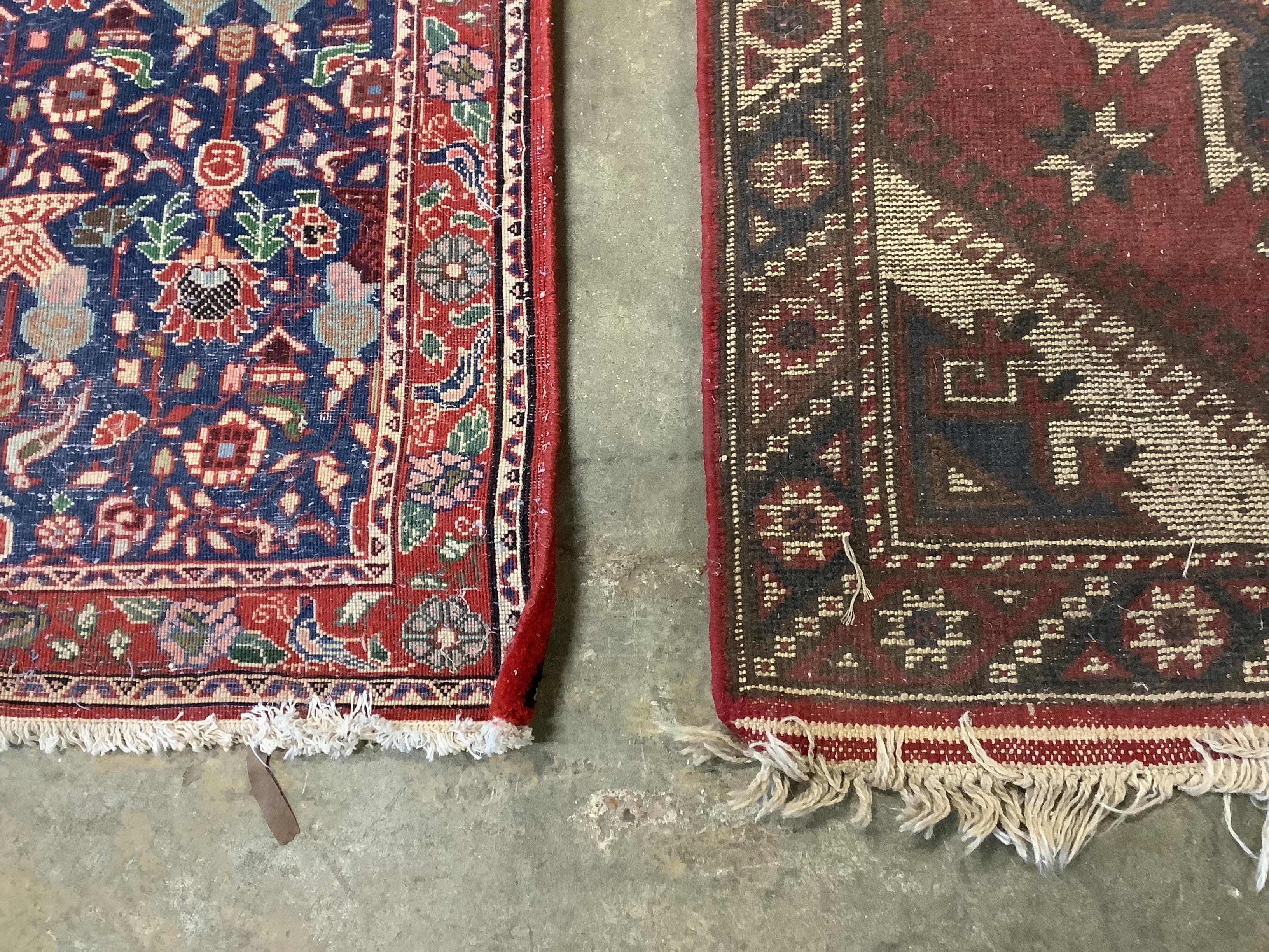 A Caucasian style red ground rug together with a North West Persian blue ground rug, larger 124 x 73cm